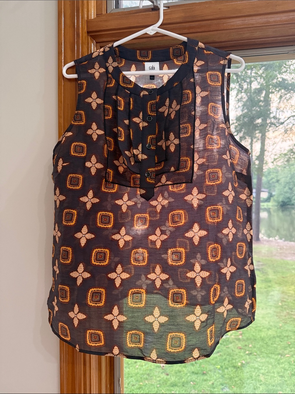 CAbi Sleeveless Sheer Blouse in Brown with Orange Geometric Print